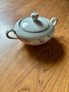 Lovely sugar and cream set.   pink and yellow with scattered rosebuds